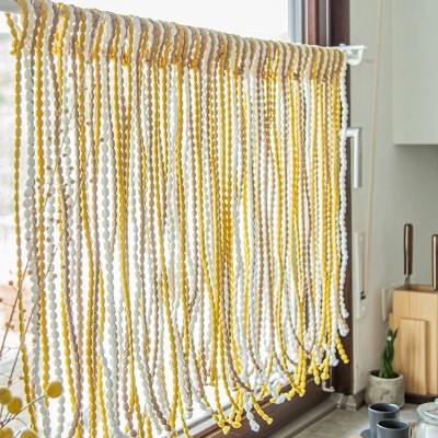 Pomponvorhang gelb beige weiß